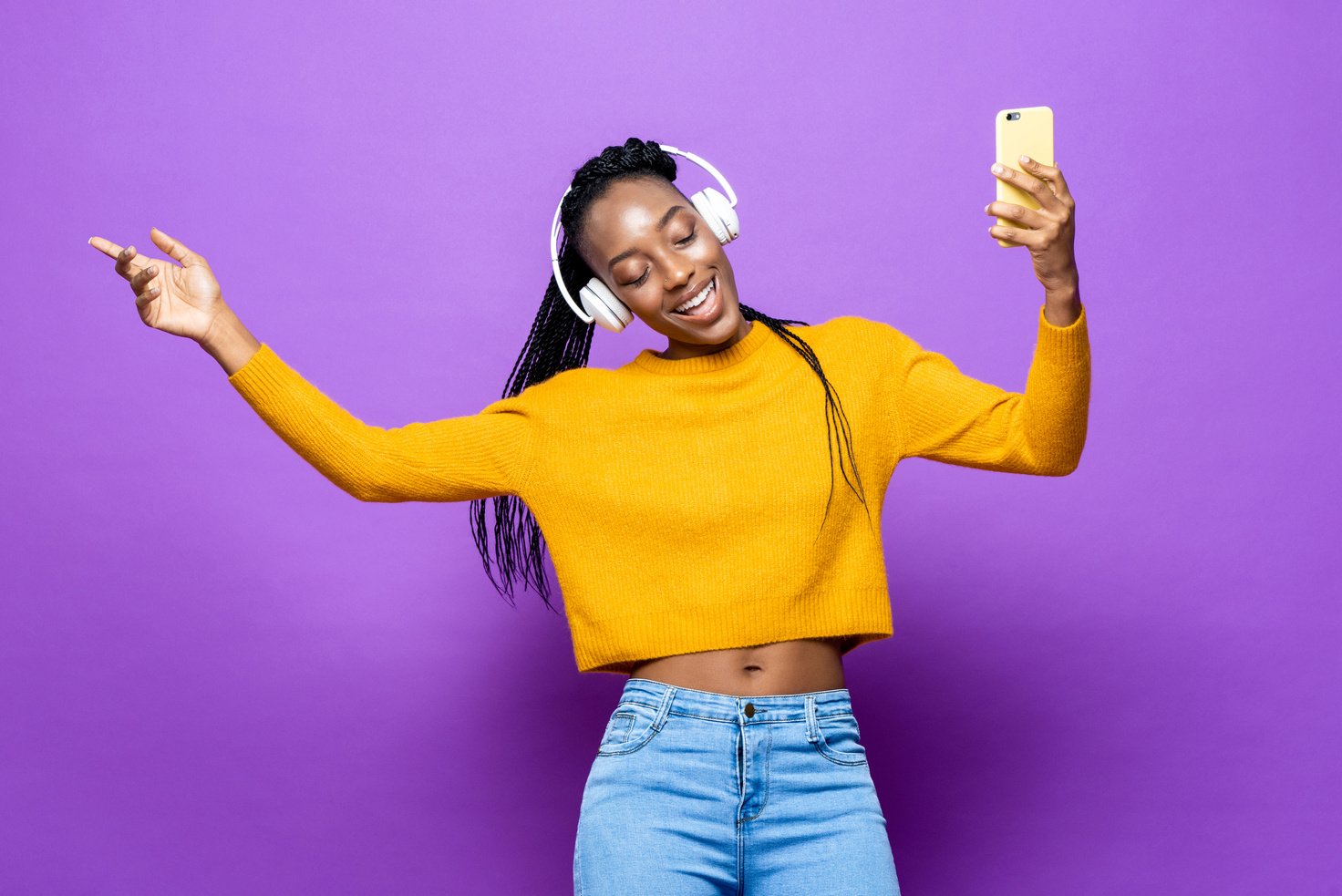 Woman Listening and Dancing to Music